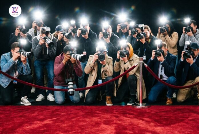Paparazzi Red Carpet Fame Scene Paparazzi photographers crowd behind a velvet rope on a red carpet with bright camera flashes, symbolizing sudden fame and public attention.